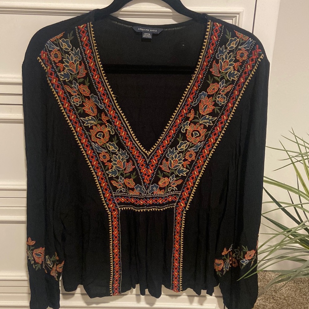 Black long sleeve blouse.